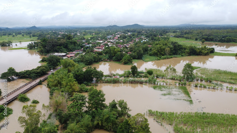 Fototapeta premium aerial view of flooded land, Thailand floods in Nongbualumphu