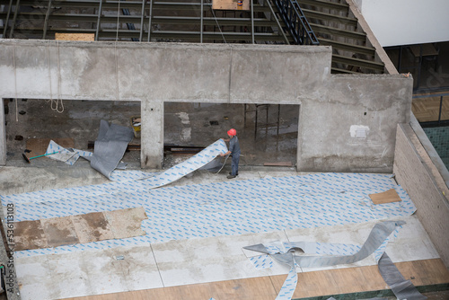 man working construction of a building