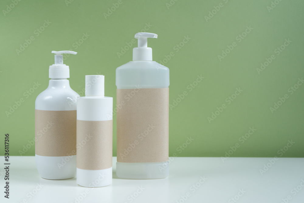 template of cosmetic jars shampoo and dispenser, with a place for design on a green background. packaging for cosmetics on a beautiful background.
template of cosmetic jars shampoo and dispenser, with a place for design on a green background. packaging for cosmetics on a beautiful background.