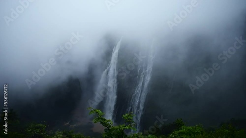 Marvelous Jog falls, water falling from top of the hill, covered with heavy thick fog. photo