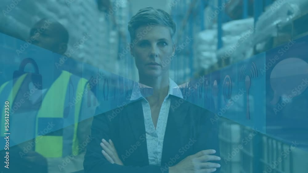 Animation of media icons over diverse workers in warehouse Animation of media icons over diverse workers in warehouse