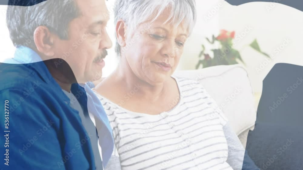 Animation of shapes over senior biracial couple using laptop for online shopping Animation of shapes over senior biracial couple using laptop for online shopping