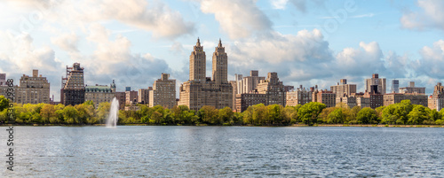 New York Skyline panorama with Eldorado building and reservoir with fountain in Central Park in midtown Manhattan photo