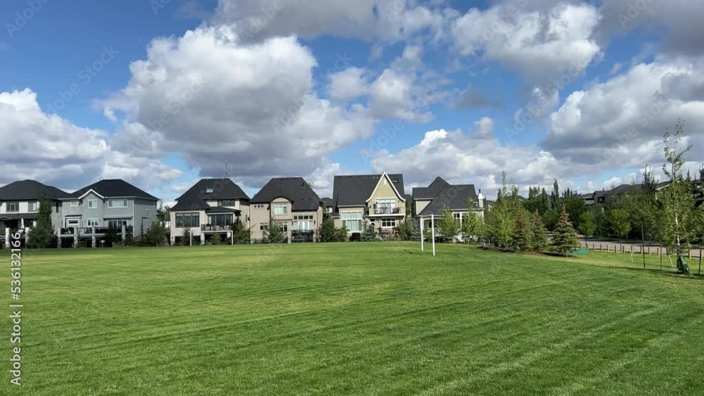 Panning shot of suburban homes in the Calgary community of Aspen Estates. Panning shot of suburban homes in the Calgary community of Aspen Estates.