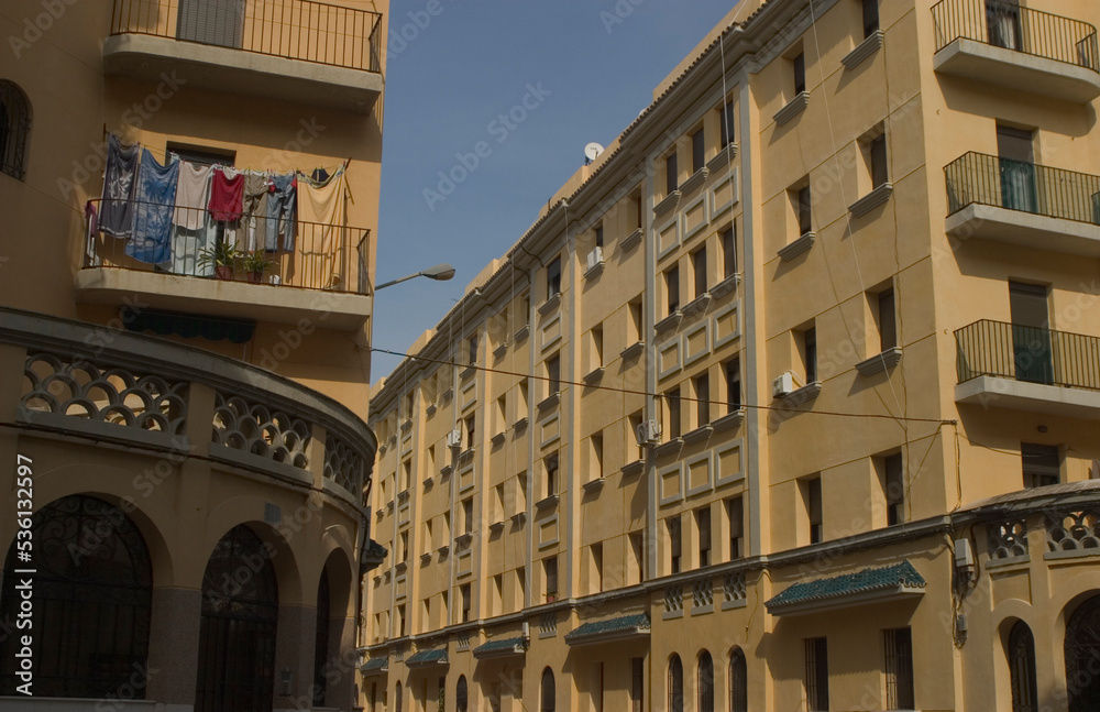 View of some buildings in the autonomous city of Ceuta. Homes with a balcony and clothes on a clothesline.