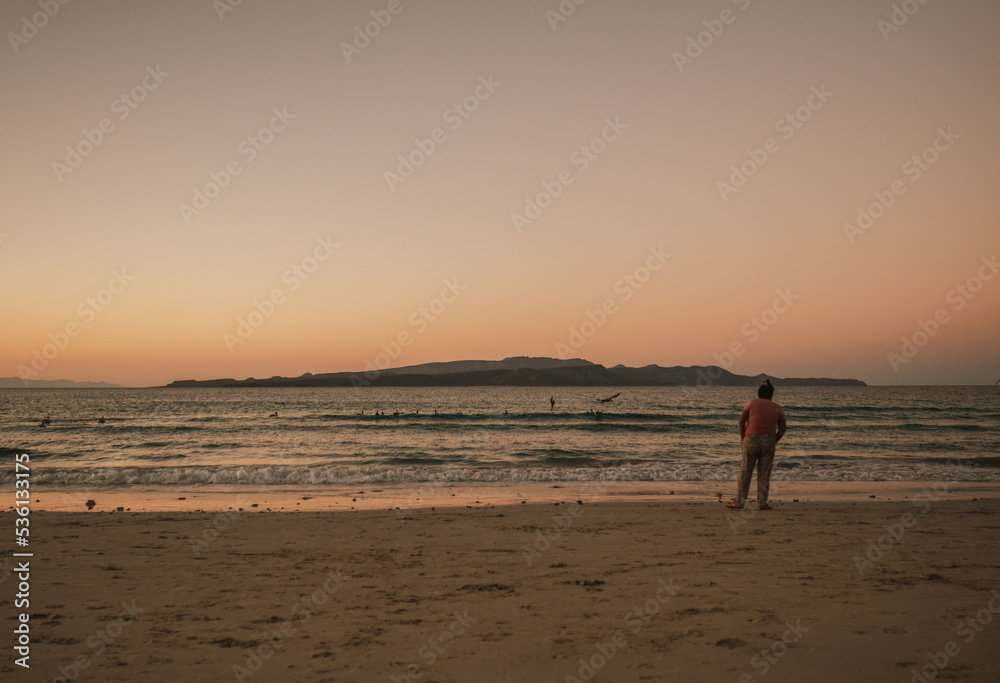 Men watching sunset, Tecolote, Baja California, Mexico