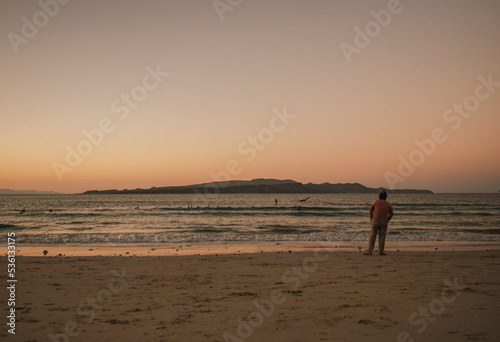 Men watching sunset, Tecolote, Baja California, Mexico