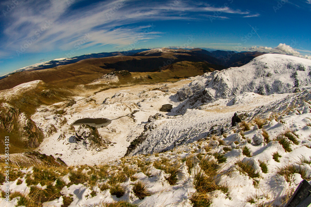 Obraz premium The Transalpina, also known as DN67C, is a high-altitude, paved mountain road in Romania, reaching a peak of 2,145 meters (7,037 feet) at Urdele Pass, making it the highest road in the country