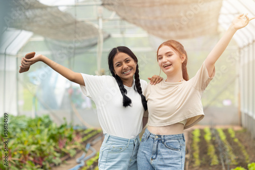 two young teen mixrace friend happy cheerful together in agriculture farm background photo