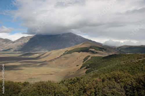 Italy, Perugia: Glimpse of the Umbrian valley near Castelluccio.