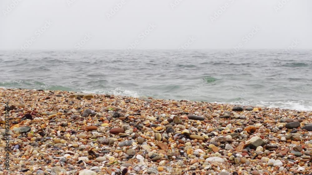 Beach Pebbles and Sea Waves in the morning Beach Pebbles and Sea Waves in the morning