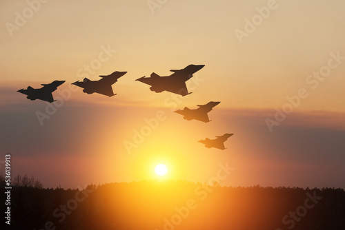 Air Force Day. Aircraft silhouettes on background of sunset or sunrise.