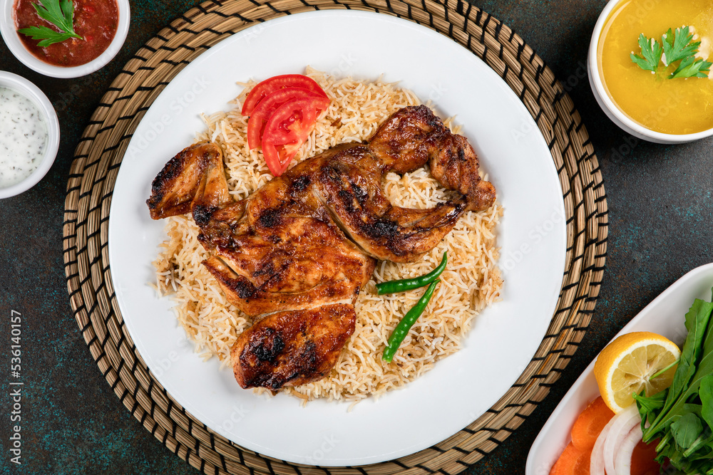kabsah is a traditional dish from Yemen of Chicken, rice, and spices. kabsah is a traditional dish from Yemen of Chicken, rice, and spices.