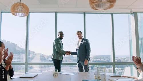 Hand shake, diversity partnership and business meeting celebration for b2b deal, negotiation or merger success. Handshake, collaboration and welcome to corporate company with group of people clapping photo