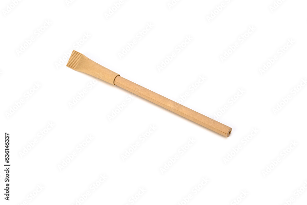Pen made from environmental recycled paper isolated on a white background. Mock up for branding. Eco concept. Pen made from environmental recycled paper isolated on a white background. Mock up for branding. Eco concept.