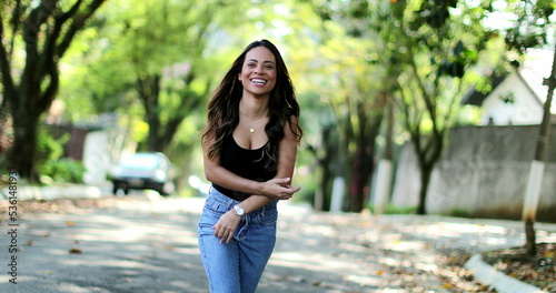 Fotografija Girl bouncing breasts happy dancing outside