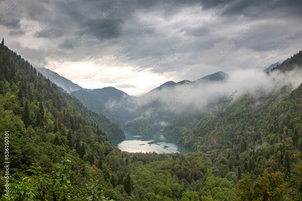 Landscape in caucasus mountains with lake Ritsa