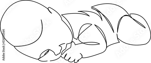 newborn baby lying on stomach