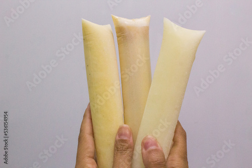 Brazilian sweet frozen homemade - Freezer pops gourmet, ice scream in the bag. Known in Brazil as: Sacolé, dindin, chupchup or geladinho. Peanut flavor.