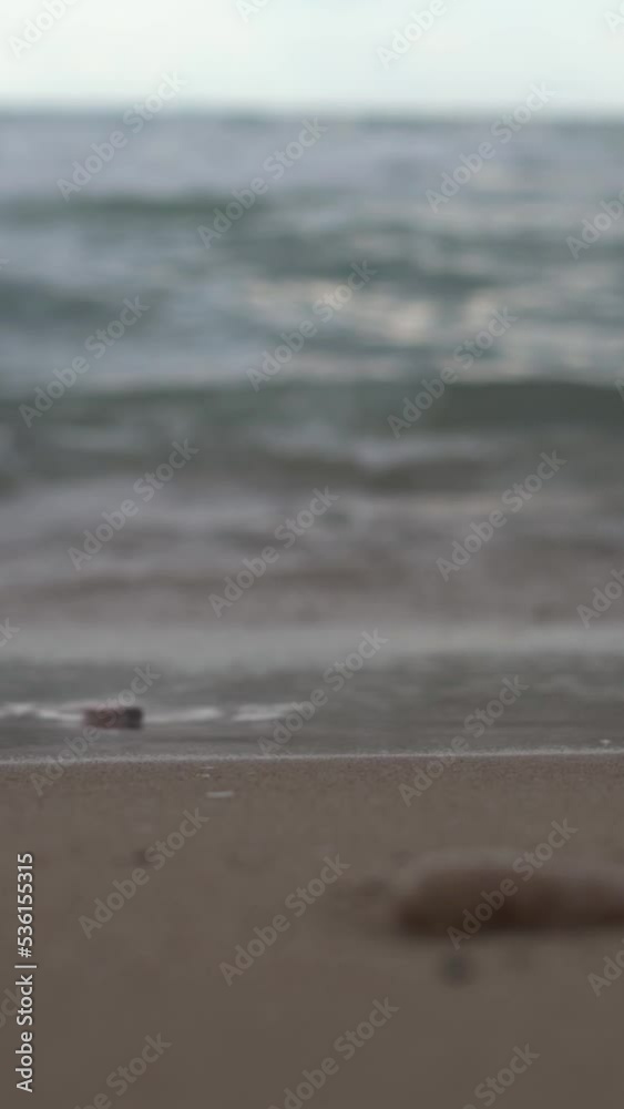 Slow motion, close-up of the ocean waves, from the beach Slow motion, close-up of the ocean waves, from the beach