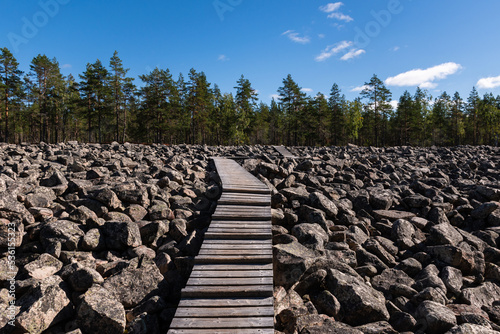 Wooden walkway across the Boulder field, Kivijata in Lauhanvuori National Park, Isojoki, Finland.