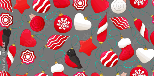 Christmas balls background. Colorful christmas balls on green backdrop. Star, heart shape, red ball , bullfinch, Santa sock, candy cane. Christmas glass toys backdrop, textile, fabric texture.