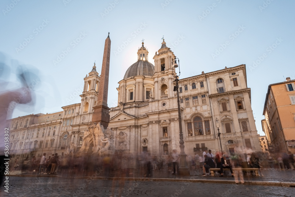 Long Exposition Shot With Blurred People of the Church of Sant'Agnese in Agone in the Centre of Rome in Piazza Navona