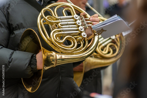 Musician From A Popular Band Playing English Horn During A Religious Procession