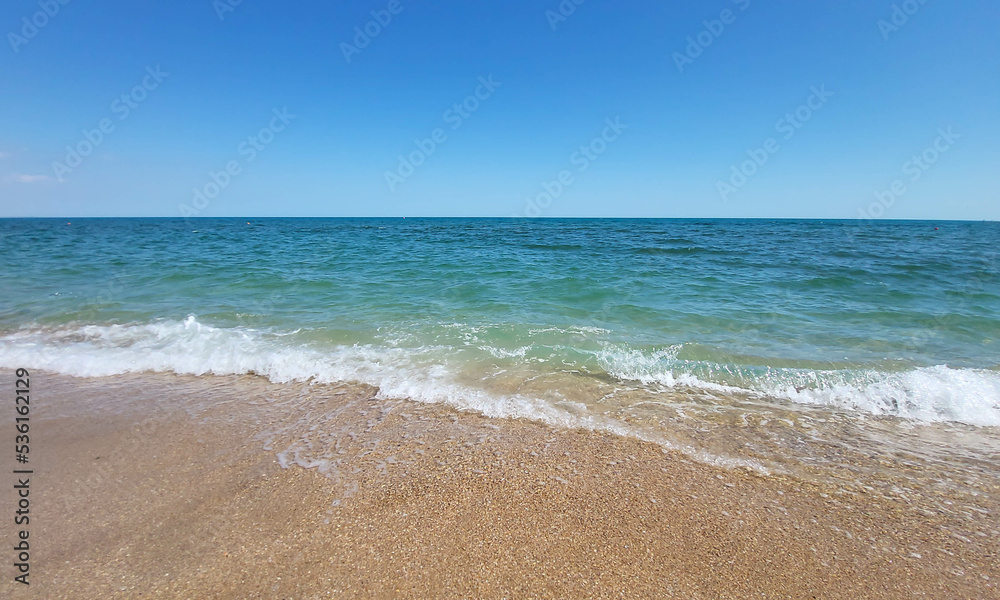 Beautiful azure sea and beach on a clear sunny day