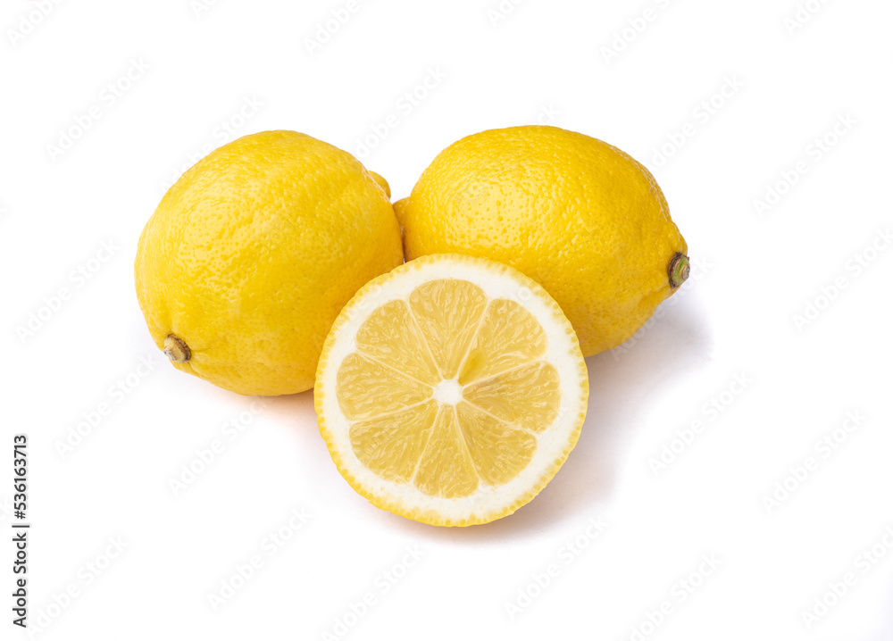 Sicilian lemons and half fruit isolated over white background