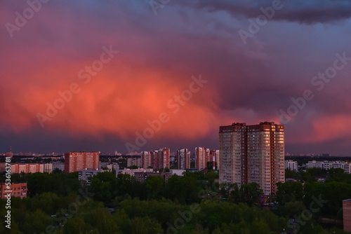 Colorful sunset over city, bright colorful sky over city