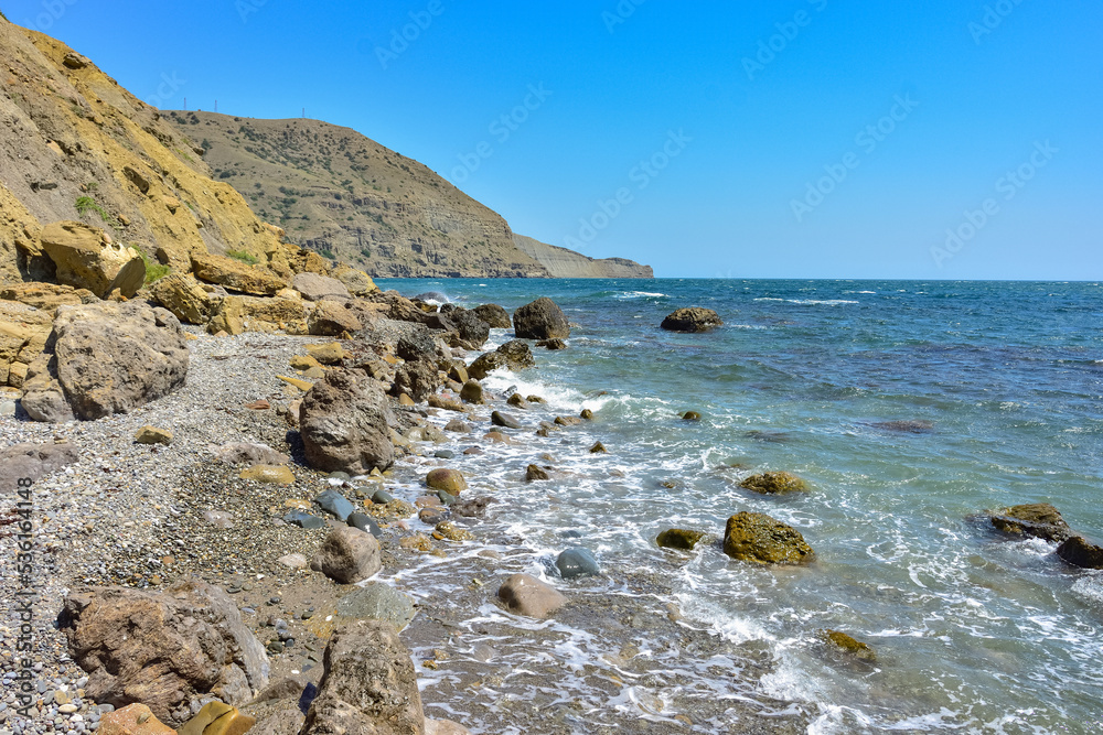 rocky shore of Black Sea, landscape with rocks on seashore, rocks sticking out of sea rocky shore of Black Sea, landscape with rocks on seashore, rocks sticking out of sea