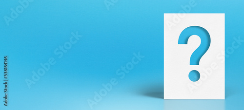 Note paper with question mark on blue background