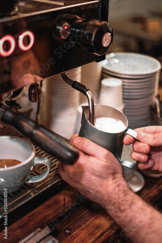 maker pouring coffee
