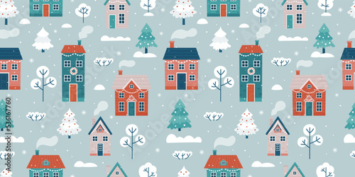 Seamless pattern with winter landscape and houses. Seamless background for Christmas and winter holidays.