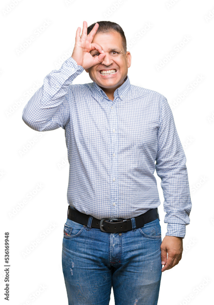Middle age arab business man over isolated background doing ok gesture with hand smiling, eye looking through fingers with happy face. Middle age arab business man over isolated background doing ok gesture with hand smiling, eye looking through fingers with happy face.
