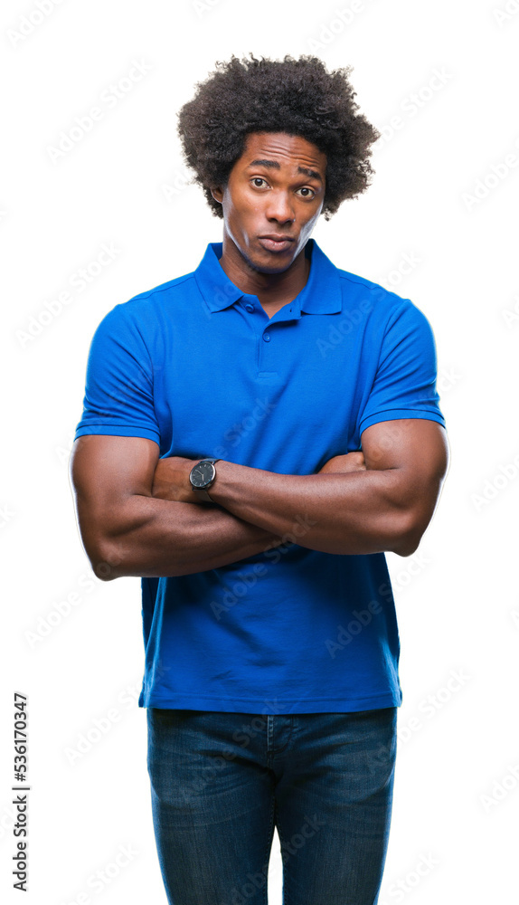 Afro american man over isolated background skeptic and nervous, disapproving expression on face with crossed arms. Negative person. Afro american man over isolated background skeptic and nervous, disapproving expression on face with crossed arms. Negative person.