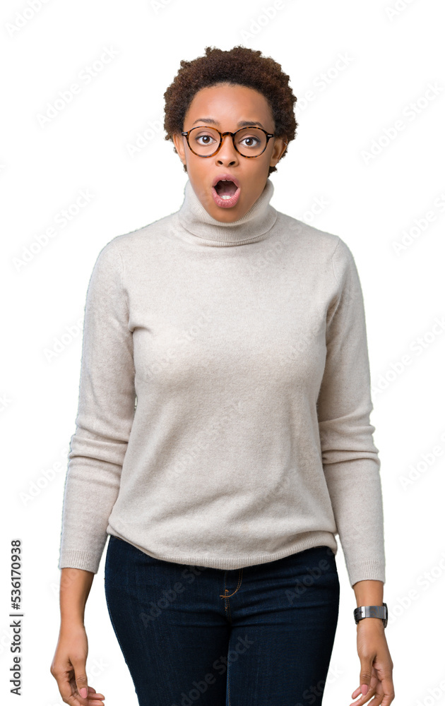 Young beautiful african american woman wearing glasses over isolated background afraid and shocked with surprise expression, fear and excited face. Young beautiful african american woman wearing glasses over isolated background afraid and shocked with surprise expression, fear and excited face.