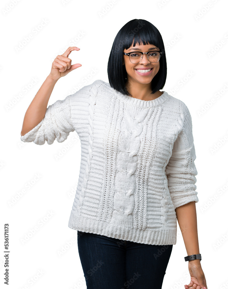 Beautiful young african american woman wearing glasses over isolated background smiling and confident gesturing with hand doing size sign with fingers while looking and the camera. Measure concept. Beautiful young african american woman wearing glasses over isolated background smiling and confident gesturing with hand doing size sign with fingers while looking and the camera. Measure concept.