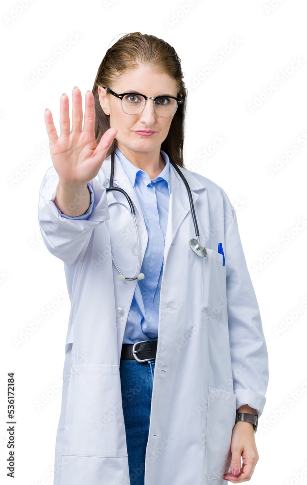 Middle age mature doctor woman wearing medical coat over isolated background doing stop sing with palm of the hand. Warning expression with negative and serious gesture on the face. Middle age mature doctor woman wearing medical coat over isolated background doing stop sing with palm of the hand. Warning expression with negative and serious gesture on the face.