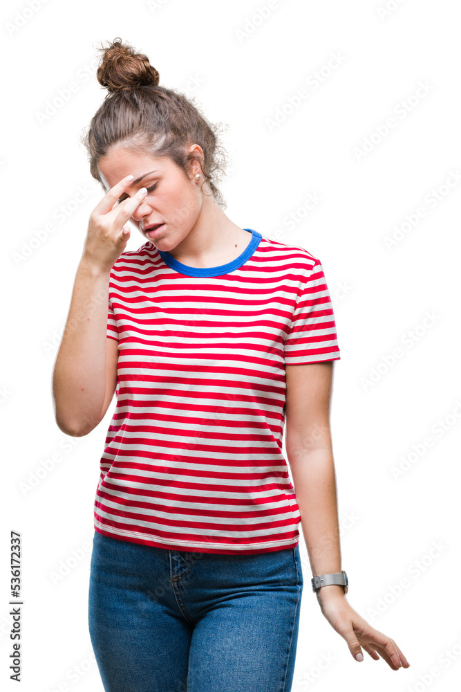 Beautiful brunette curly hair young girl wearing casual look over isolated background tired rubbing nose and eyes feeling fatigue and headache. Stress and frustration concept. Beautiful brunette curly hair young girl wearing casual look over isolated background tired rubbing nose and eyes feeling fatigue and headache. Stress and frustration concept.