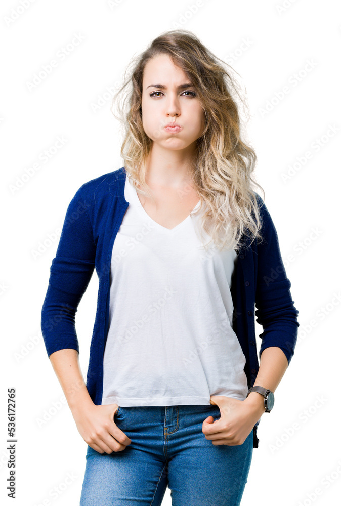 Obraz premium Beautiful young blonde woman over isolated background puffing cheeks with funny face. Mouth inflated with air, crazy expression.