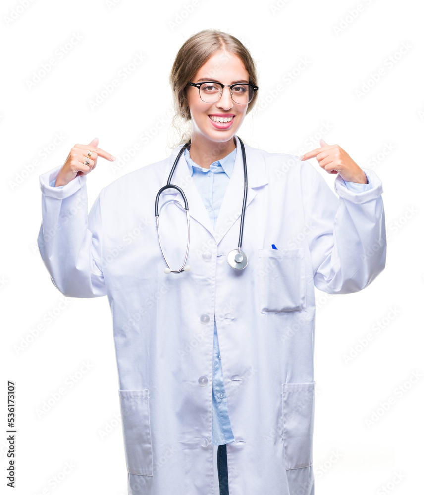 Beautiful young blonde doctor woman wearing medical uniform over isolated background looking confident with smile on face, pointing oneself with fingers proud and happy. Beautiful young blonde doctor woman wearing medical uniform over isolated background looking confident with smile on face, pointing oneself with fingers proud and happy.