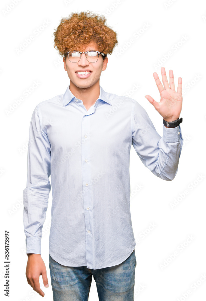 Young handsome business man with afro wearing glasses showing and pointing up with fingers number five while smiling confident and happy. Young handsome business man with afro wearing glasses showing and pointing up with fingers number five while smiling confident and happy.