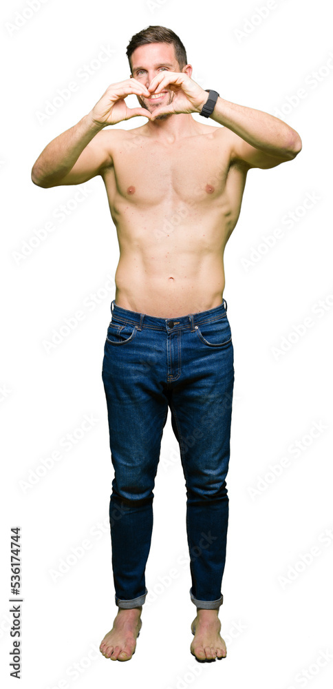 Handsome shirtless man showing nude chest smiling in love showing heart symbol and shape with hands. Romantic concept. Handsome shirtless man showing nude chest smiling in love showing heart symbol and shape with hands. Romantic concept.