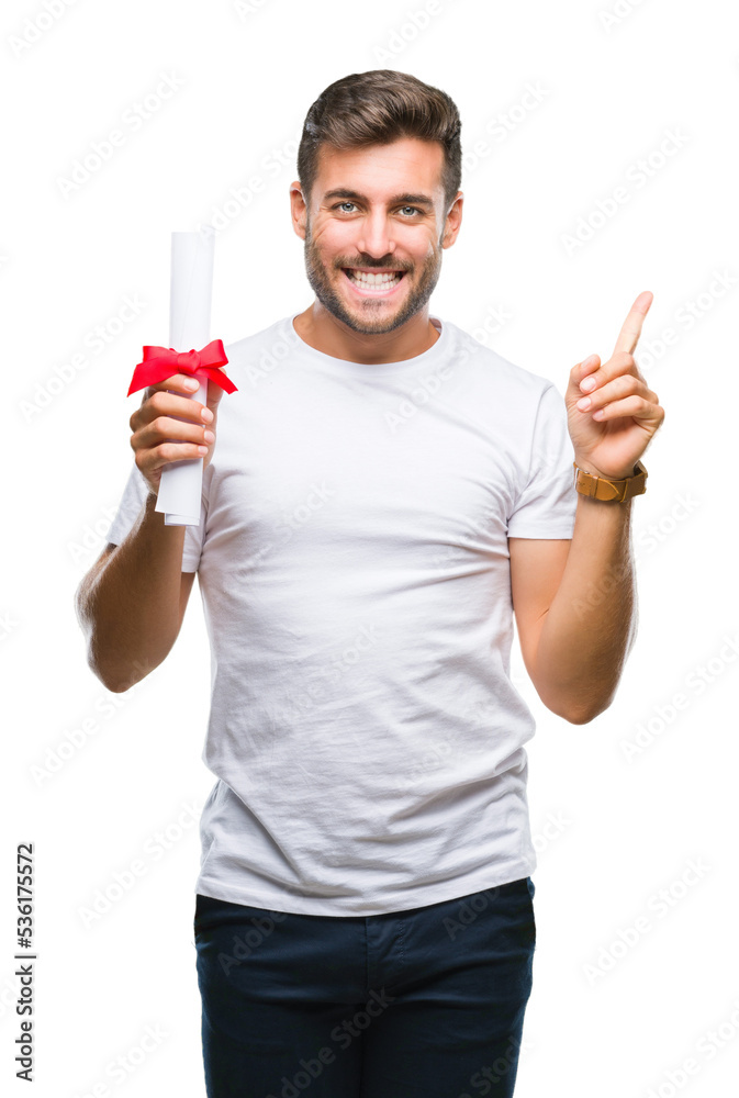 Young handsome man holding degree over isolated background very happy pointing with hand and finger to the side