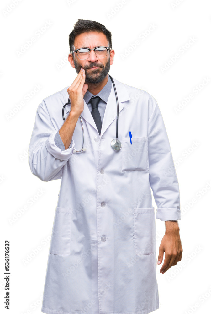 Adult hispanic doctor man over isolated background touching mouth with hand with painful expression because of toothache or dental illness on teeth. Dentist concept. Adult hispanic doctor man over isolated background touching mouth with hand with painful expression because of toothache or dental illness on teeth. Dentist concept.