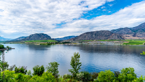 View of Osoyoos Lake with its surrounding vineyards on the mountain slopes in the Okanagen Valley of British Columbia, Canada © hpbfotos