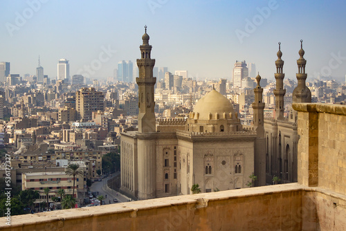 Top view of Sultan Hassan Mosque and the city of Cairo in the background