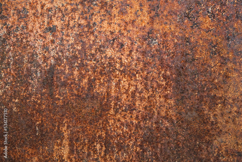 Dark light red rusty metal plate. Grunge texture. Rusty metal background. Rusty orange texture. Rust.